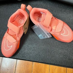 Brand new tags on Nike spin shoes